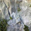 Marca de inicio del Espolón Finestrat - Flecha que marca el comienzo de la vía.