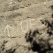 UES: flecha y nombre al inicio de la segunda parte - Nombre y flecha picdos al inicio de la segunda parte de la vía.